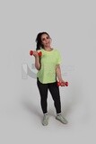 athletic girl doing weightlifting exercises