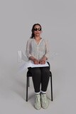 blind girl reading a book in Braille