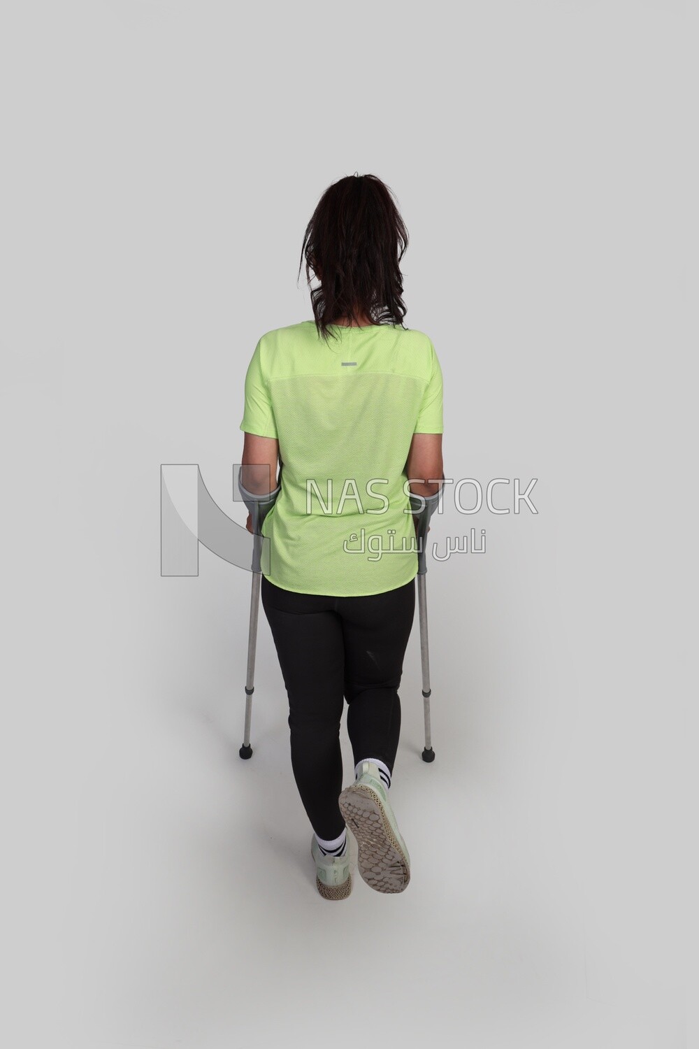 girl with an injury and using crutches