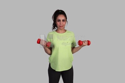 girl doing arm stretching exercises