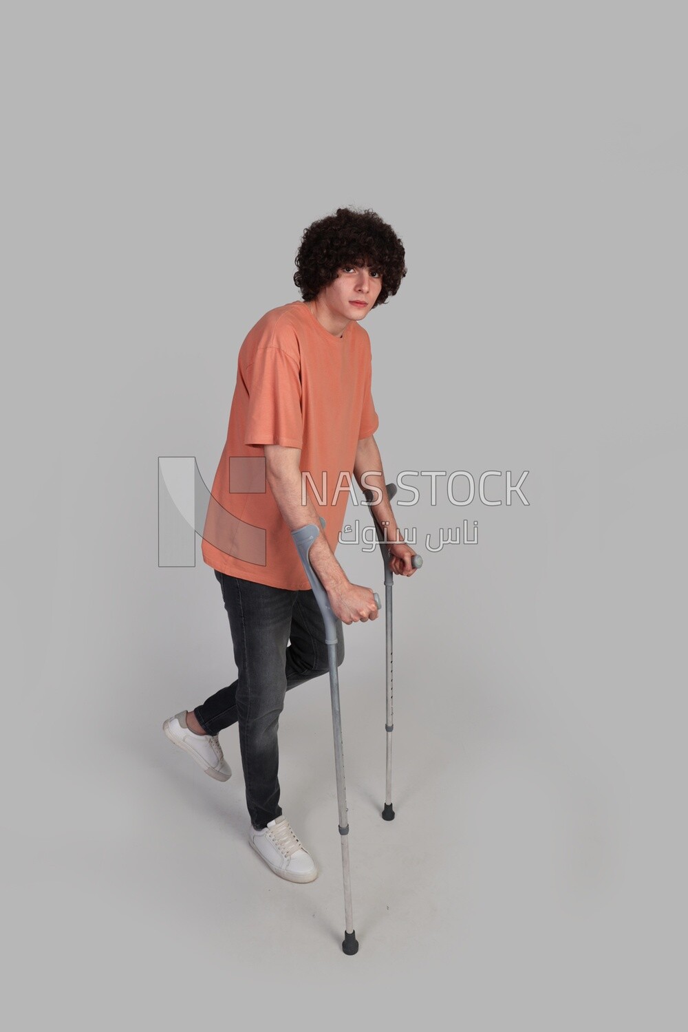 young man with a problem in his foot