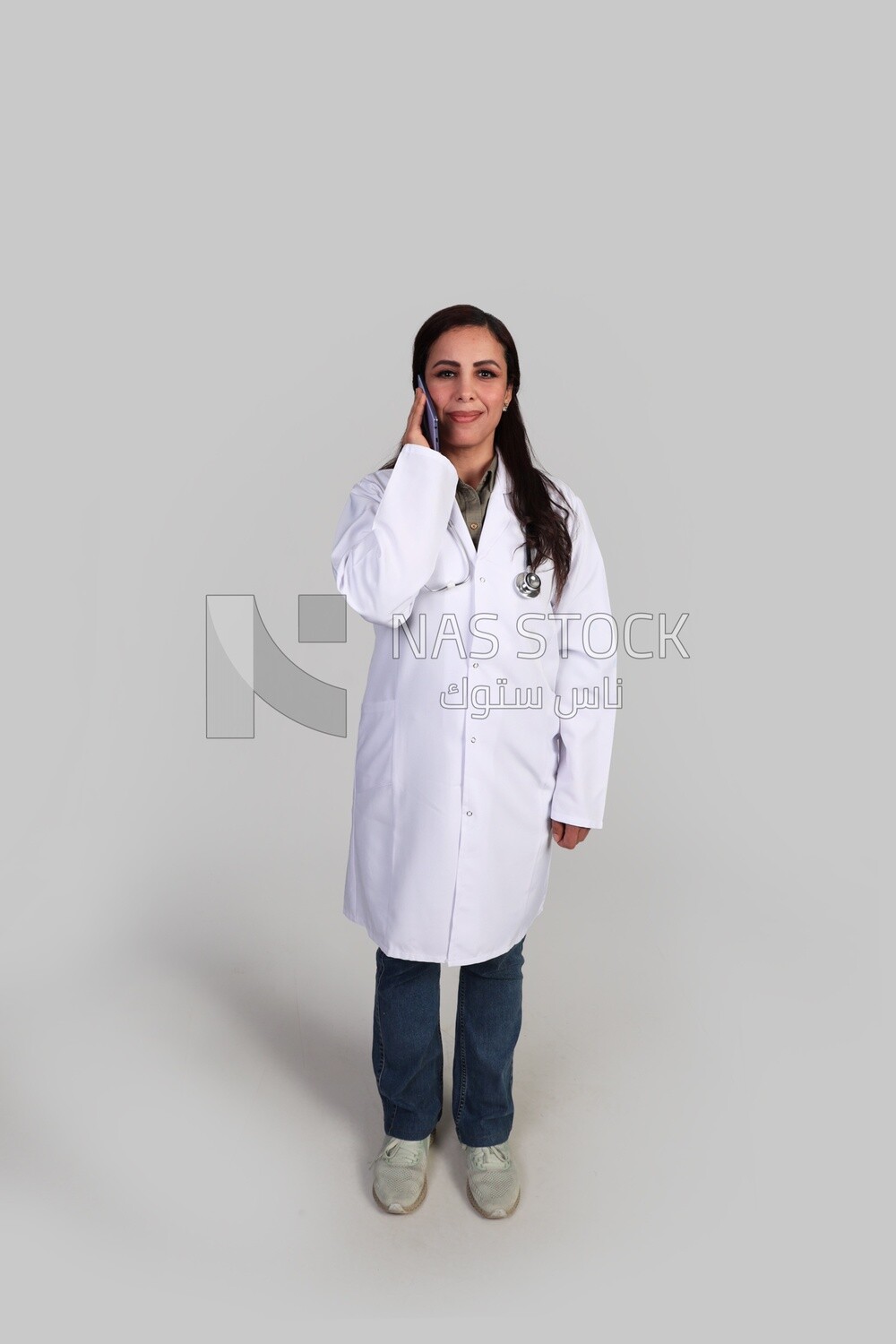 female doctor talking on the phone