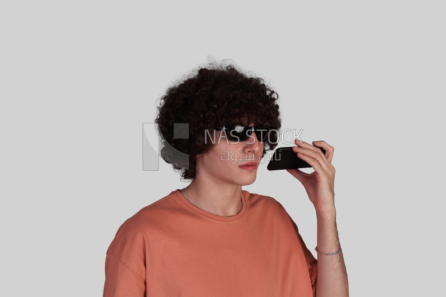 Blind teenager talking on the phone