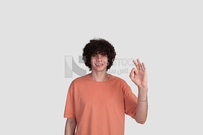 teenage boy using sign language