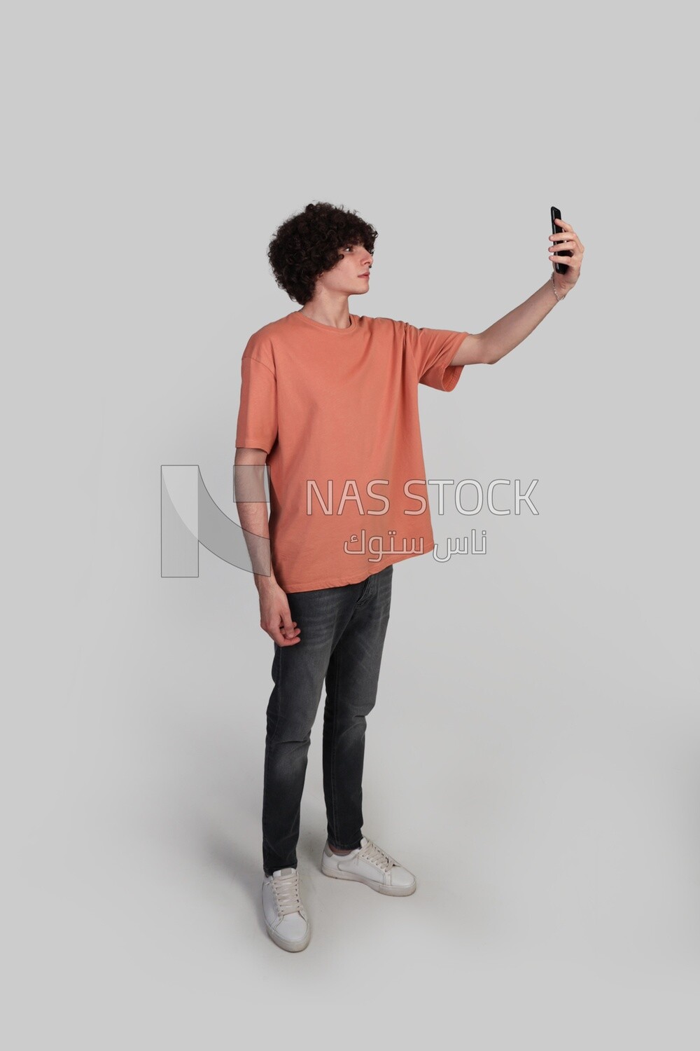 Teenager taking a selfie