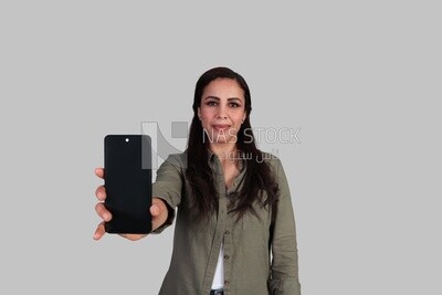 Smiling woman showing mobile phone