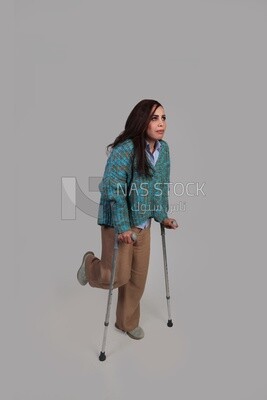 girl with a foot injury and using crutches