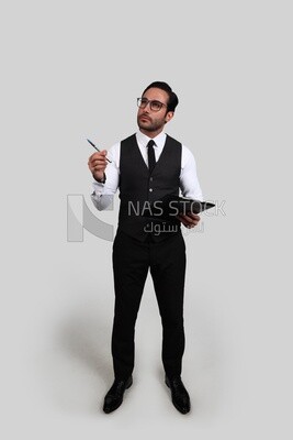 Photo of a businessman with a formal suit holding documents in one hand and a pen in the other, business development and partnerships, business meeting, Model