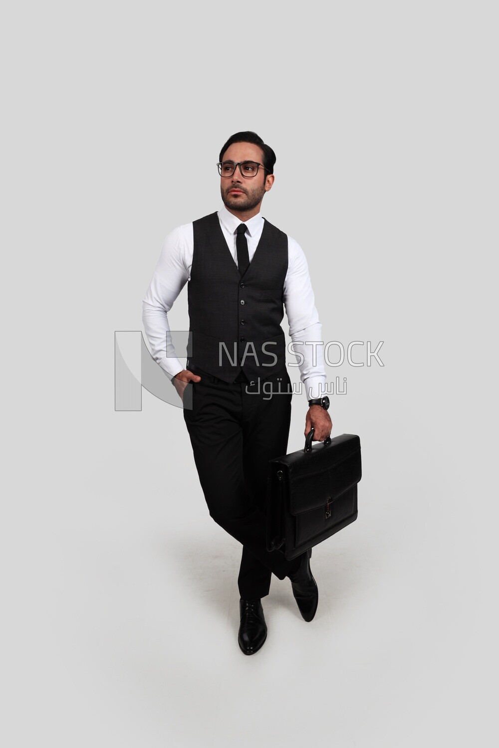 Photo of a businessman with a formal suit holding a leather bag, business development and partnerships, business meeting, Model