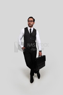 Photo of a businessman with a formal suit holding a leather bag, business development and partnerships, business meeting, Model