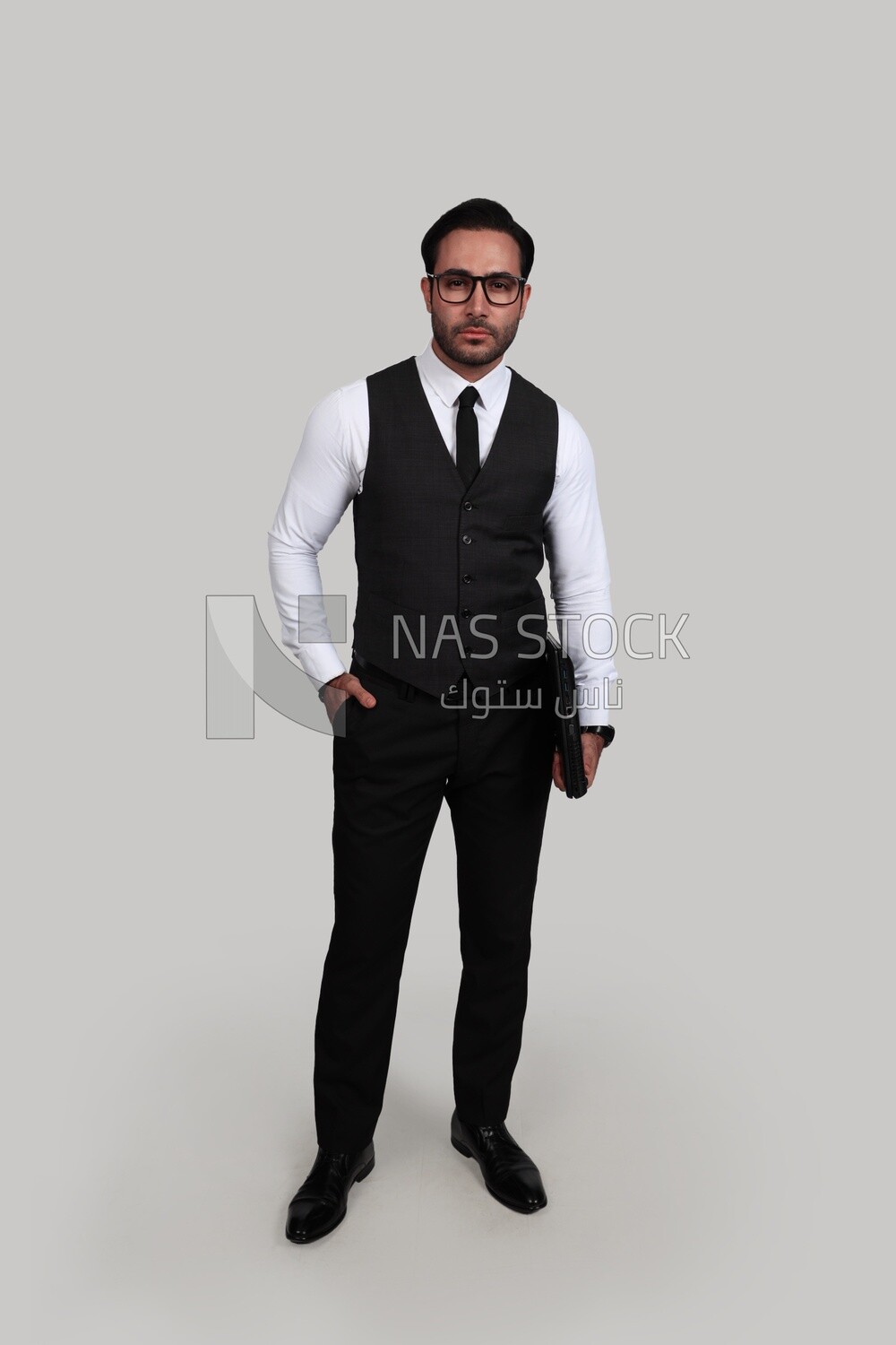 Photo of a businessman with a formal suit holding a laptop, business development and partnerships, business meeting, Model