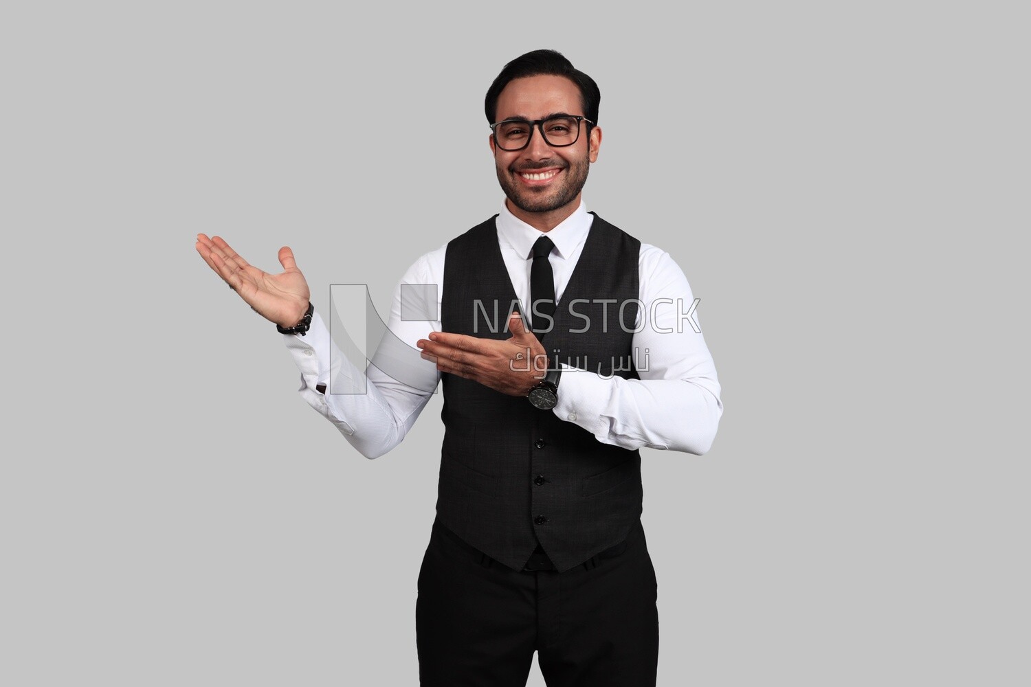 Portrait of a man wearing formal wear pointing away, business development and partnerships, business meeting, Model
