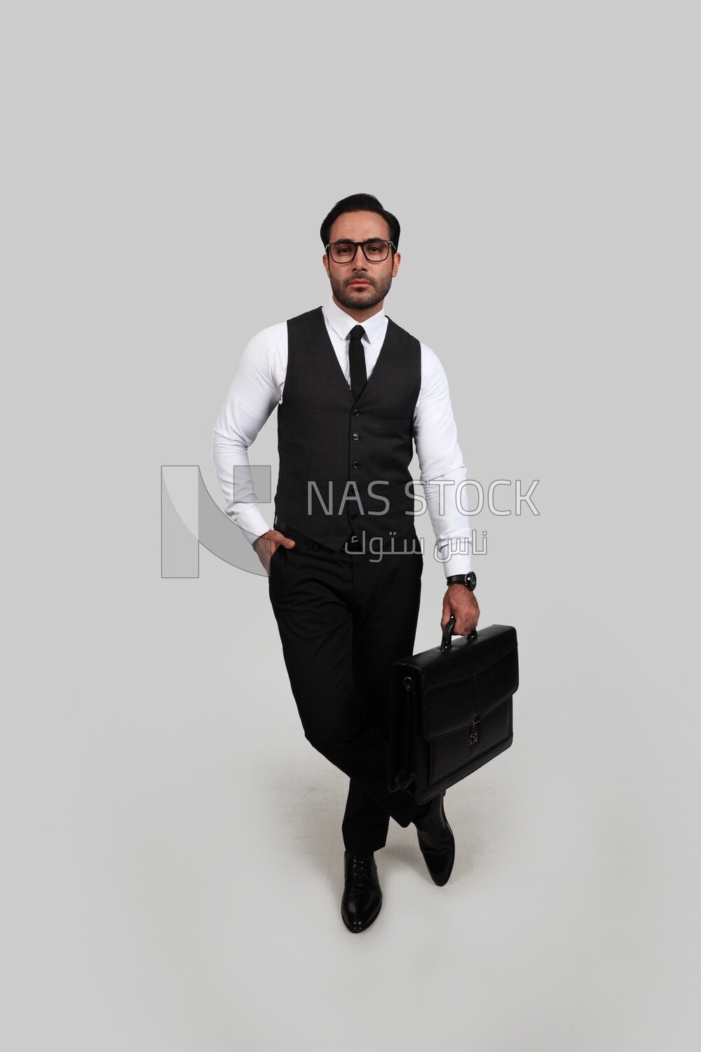 Photo of a businessman with a formal suit holding a leather bag, business development and partnerships, business meeting, Model