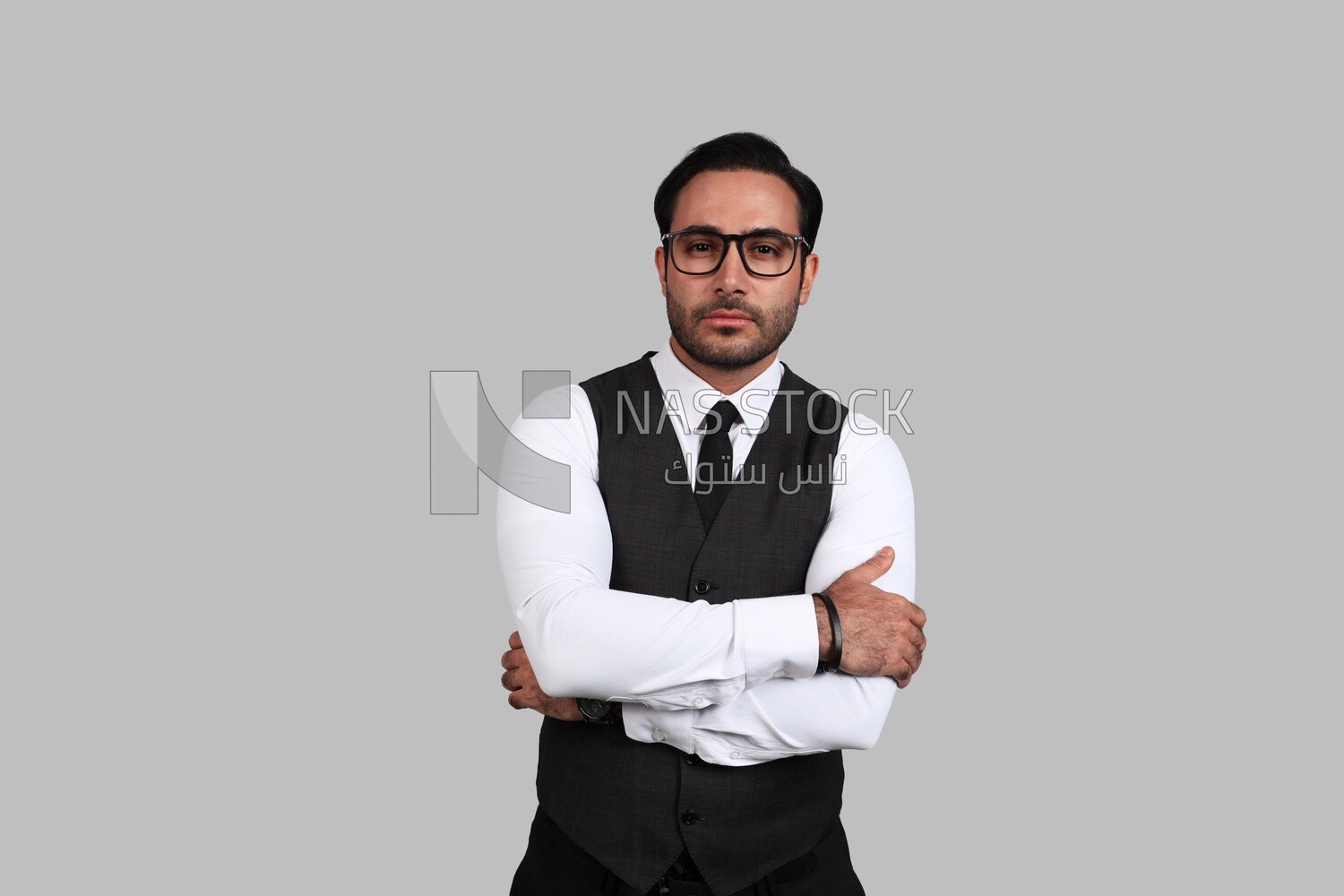 Photo of a businessman with a formal suit with crossed hands, business development and partnerships, business meeting, Model