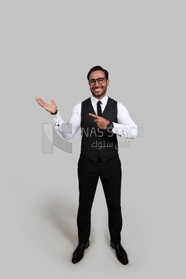 Photo of a businessman with a formal suit with hand gesture, business development and partnerships, business meeting, Model