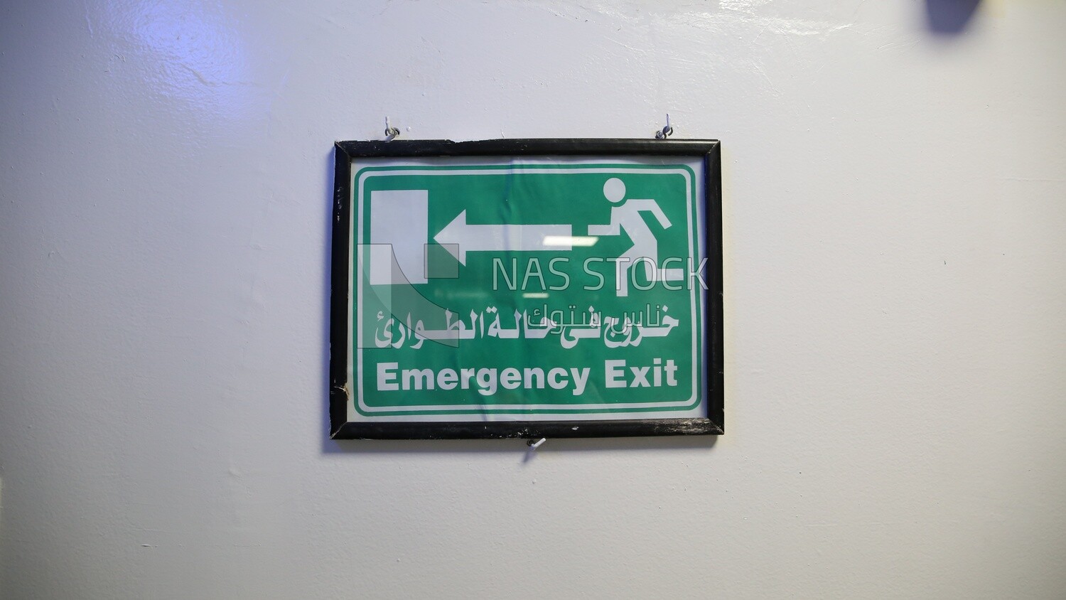 Sign Indicating The Emergency Exit Location sign-indicating-the-emergency-exit-location