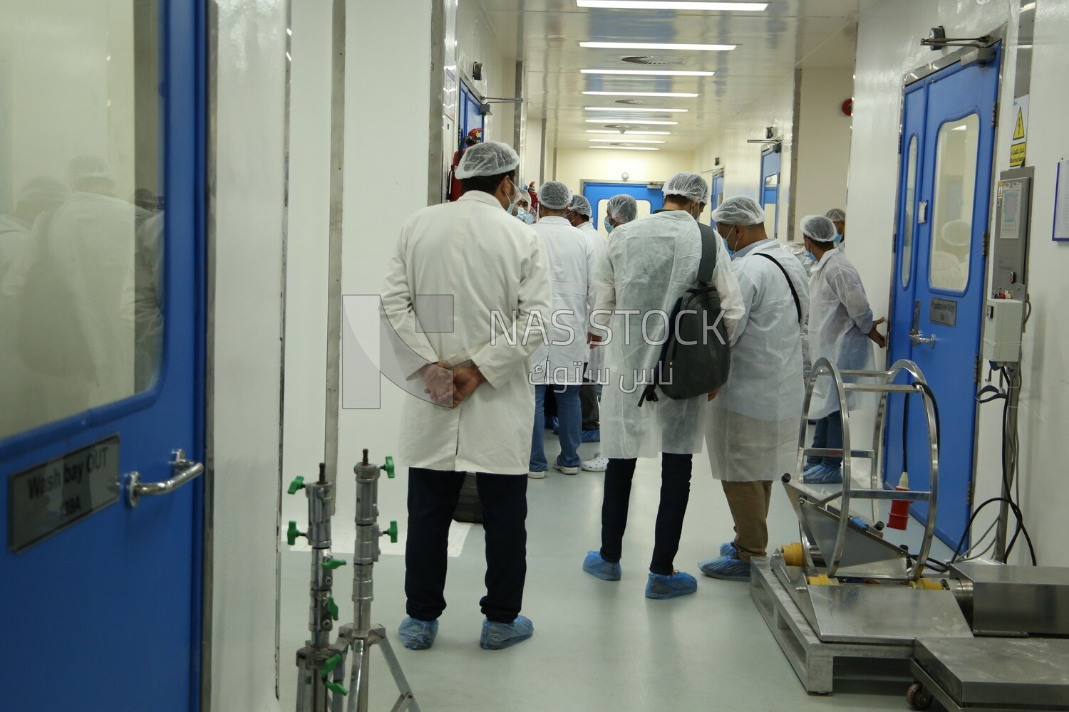 Group of doctors standing in a hospital corridor
