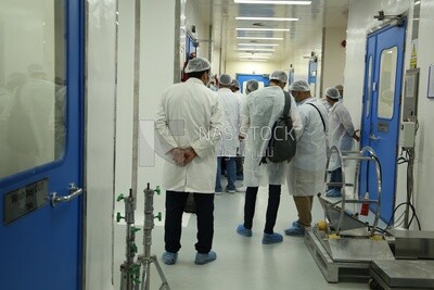 Group of doctors standing in a hospital corridor