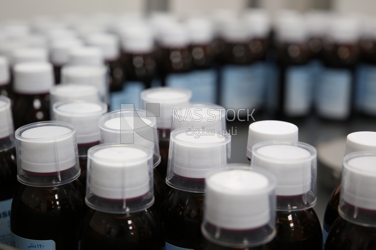 Medication bottles after filling and wrapping them