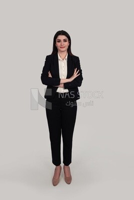 Photo of a businesswoman with formal wear standing with crossed hands, business development and partnerships, business meeting, Model