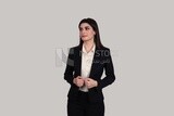 Photo of a businesswoman with formal wear standing on a white background, business development and partnerships, business meeting, Model