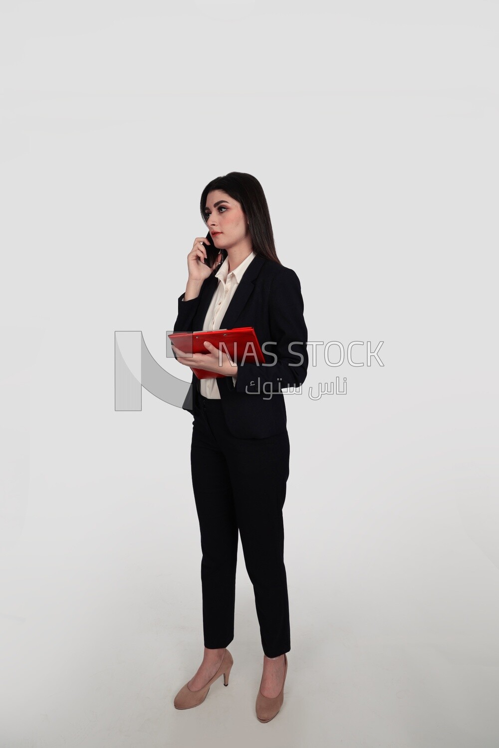 Photo of a businesswoman with a formal suit standing and holding documents, business development and partnerships, business meeting, Model