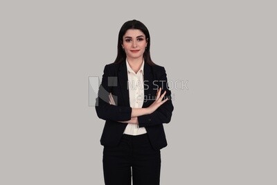 Photo of a businesswoman with formal wear standing with crossed hands, business development and partnerships, business meeting, Model
