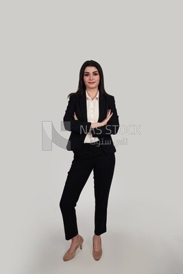 Photo of a businesswoman with formal wear standing with crossed hands, business development and partnerships, business meeting, Model