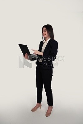 Photo of a businesswoman with a formal suit holding a laptop, business development and partnerships, business meeting, Model