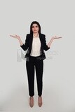 Photo of a businesswoman with formal wear standing on a white background looks like she is angry, business development and partnerships, business meeting, Model