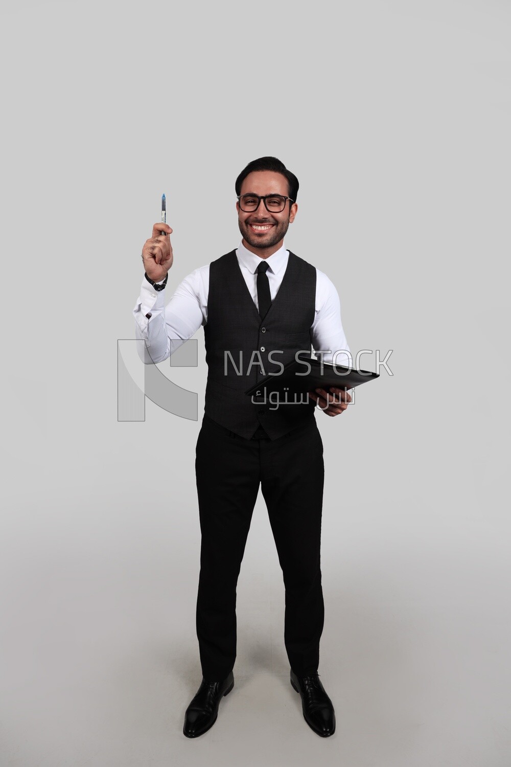 Photo of a businessman with a formal suit holding documents in one hand and a pen in the other, business development and partnerships, business meeting, Model