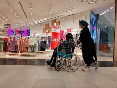 Girl shops with her mother