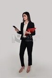 Photo of a businesswoman with formal wear standing and holding documnts checking her mobile, business development and partnerships, business meeting, Model