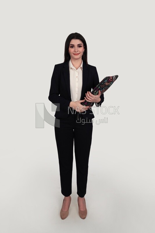 Photo of a businesswoman with a formal suit holding a laptop, business development and partnerships, business meeting, Model