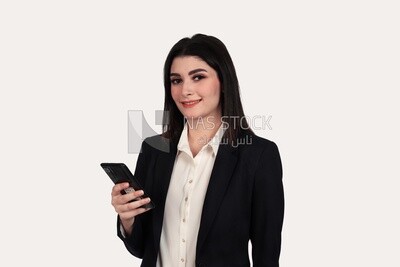 Photo of a businesswoman with formal wear holding a mobile phone, business development and partnerships, business meeting, Model