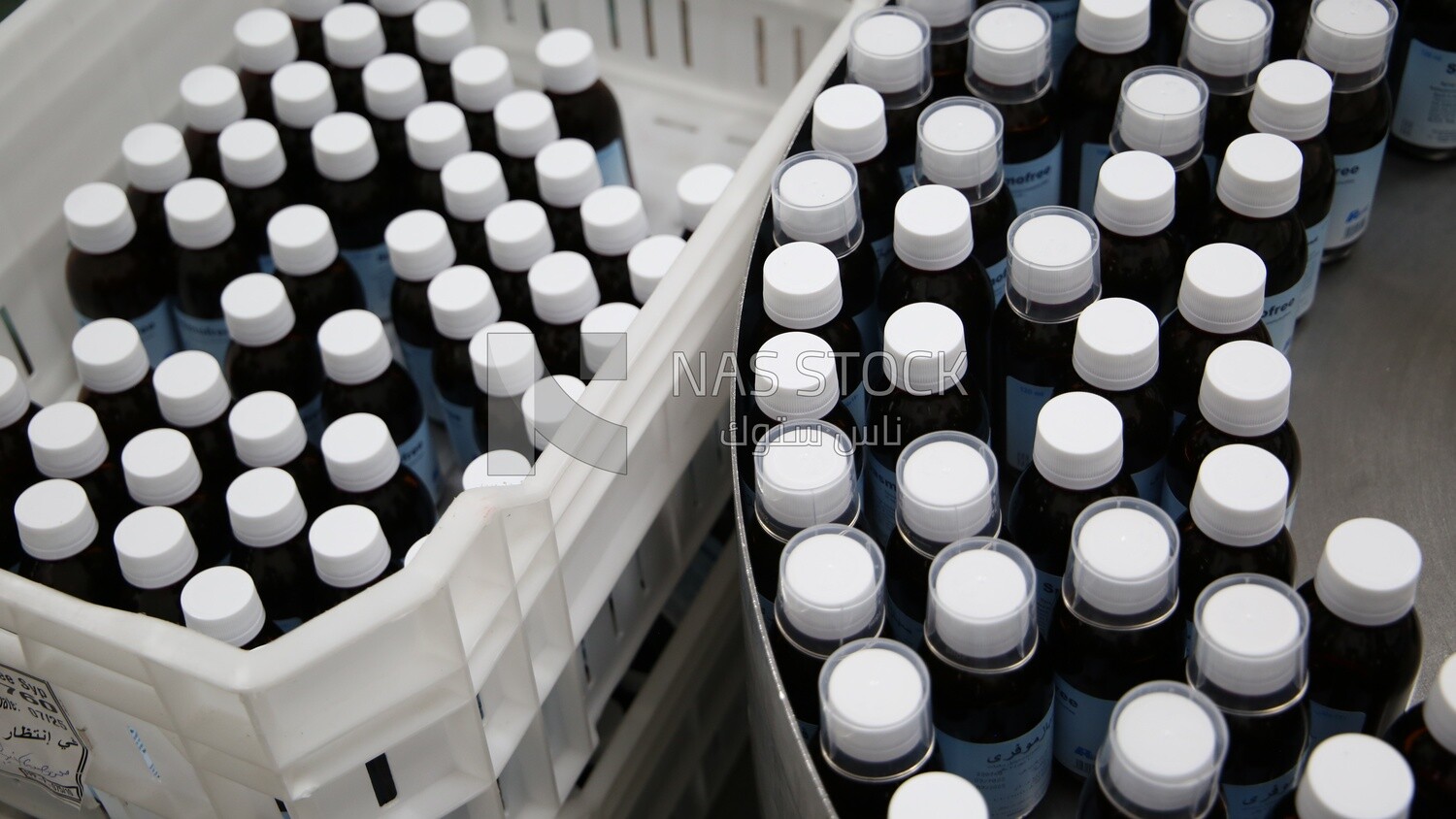 Medication bottles after filling and wrapping them