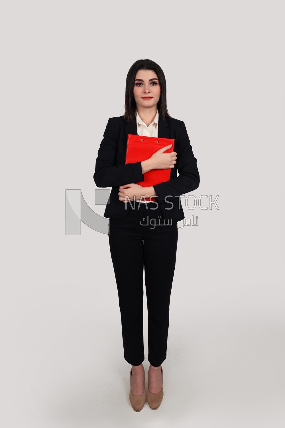 Photo of a businesswoman with a formal suit standing and holding documents, business development and partnerships, business meeting, Model
