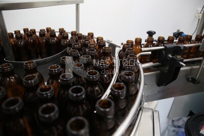 Stage of sorting drug containers and bottles before use