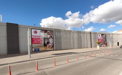 Advertising banners hanging on the wall of a mall