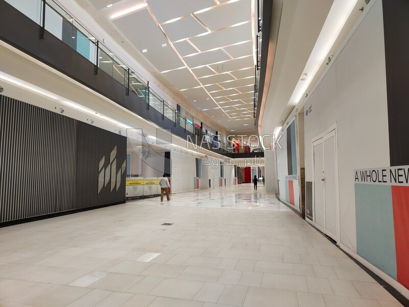 Corridor with shops in a commercial center, business centers and shopping centers