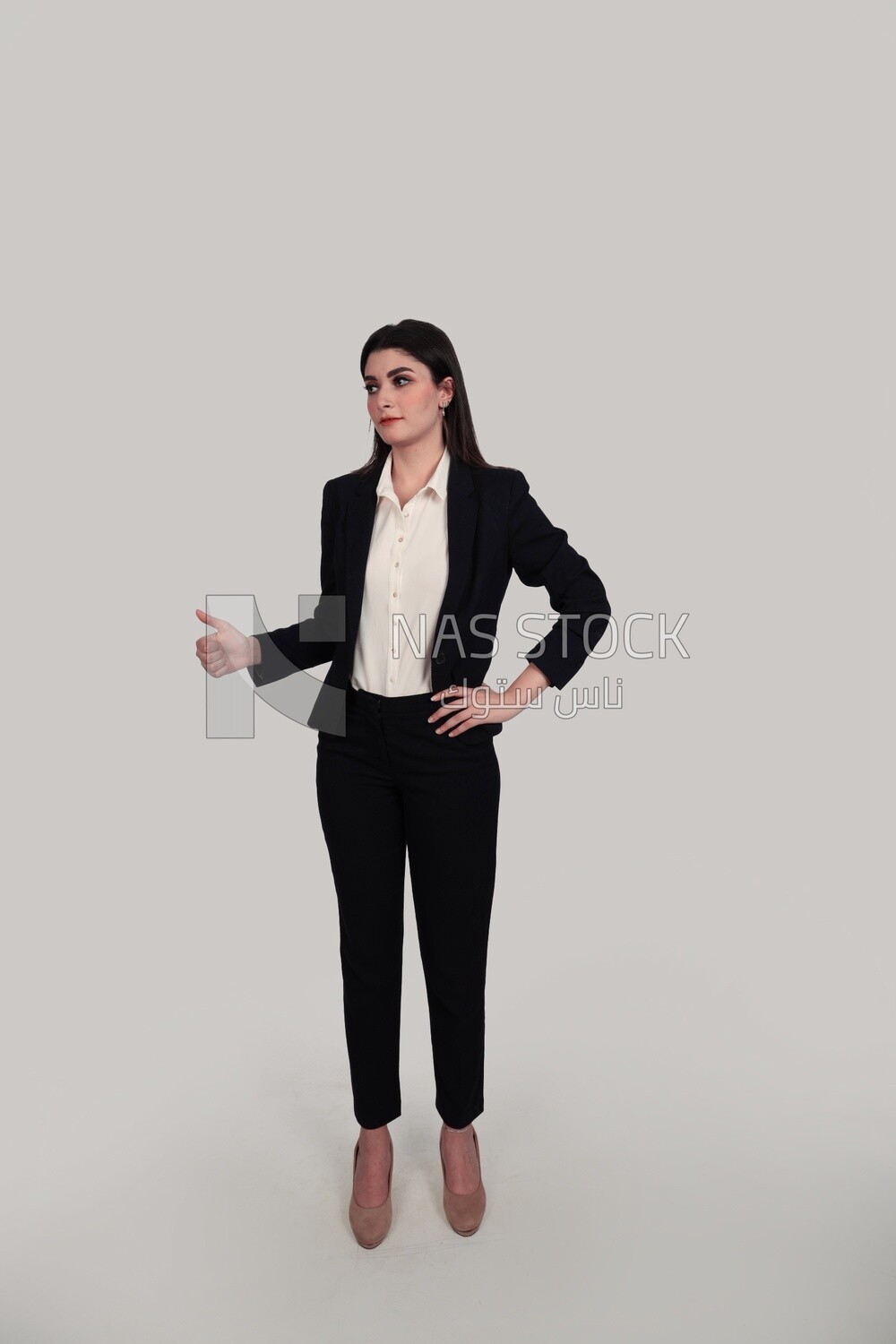 Photo of a businesswoman with formal wear standing with a hand gesture, business development and partnerships, business meeting, Model