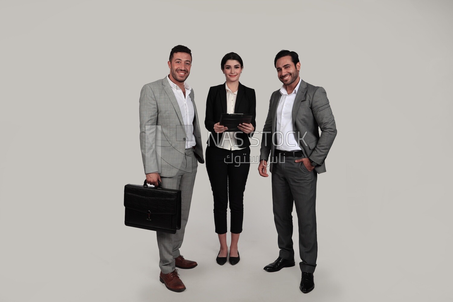 Photo of a businesswoman and two businessmen standing together, business development and partnerships, business meeting, Model