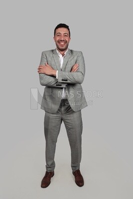 Photo of a businessman with a formal suit with crossed hands, business development and partnerships, business meeting, Model