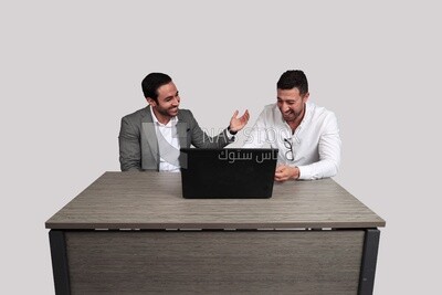 Photo of two men sitting in the office, discussing the work, business development and partnerships, business meeting, Model