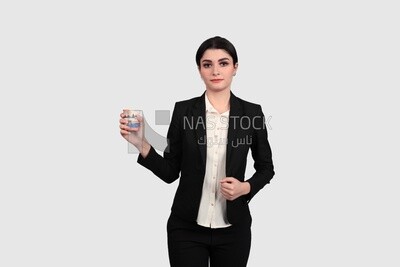 Photo of a businesswoman in formal wear holding a cup of tea, business development and partnerships, business meeting, Model