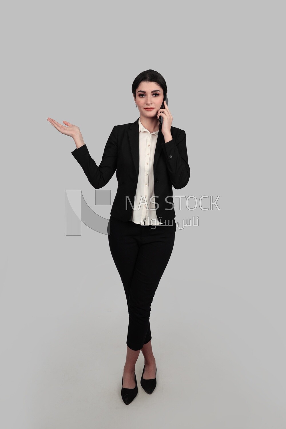 Photo of a businesswoman in formal wear talking on the phone, business development and partnerships, business meeting, Model