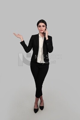 Photo of a businesswoman in formal wear talking on the phone, business development and partnerships, business meeting, Model
