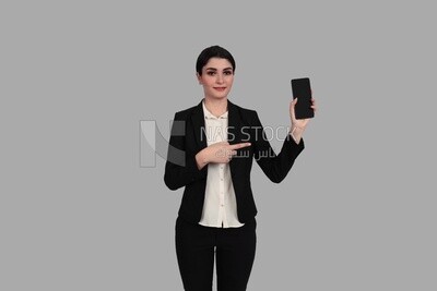 Photo of a businesswoman with a formal suit holding her mobile phone, business development and partnerships, business meeting, Model