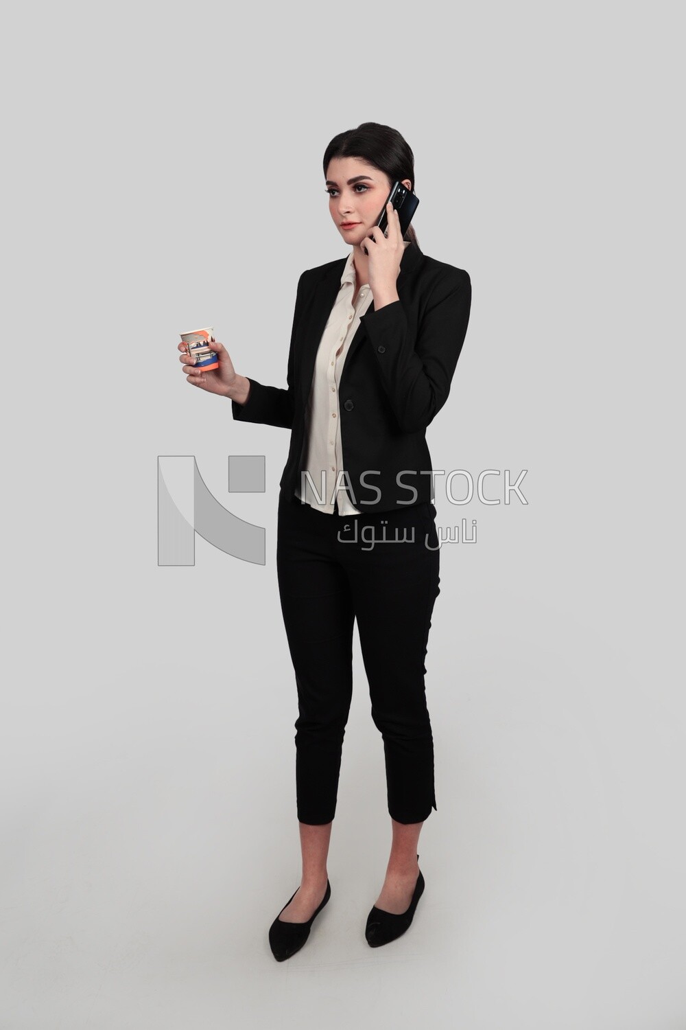 Photo of a businesswoman in formal wear talking on the phone, business development and partnerships, business meeting, Model