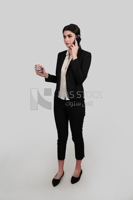 Photo of a businesswoman in formal wear talking on the phone, business development and partnerships, business meeting, Model